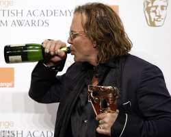 Mickey Rourke consuming alcohol
